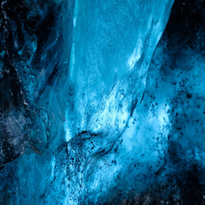 Photo of bright blue glacial ice