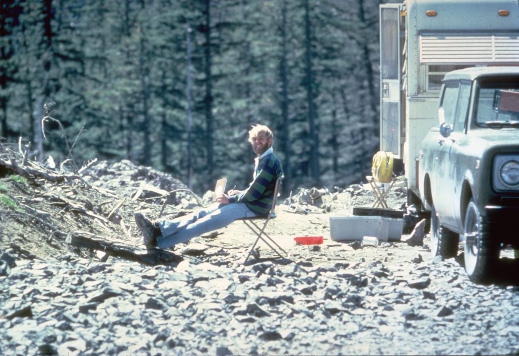 Dave Johnston sitting next to an RV.
