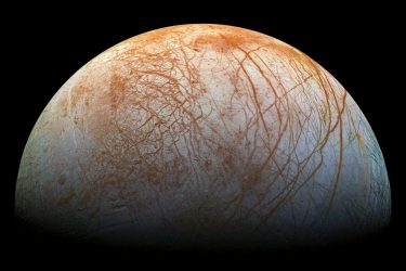 Red streaks across the surface of the moon Europa with a black background.