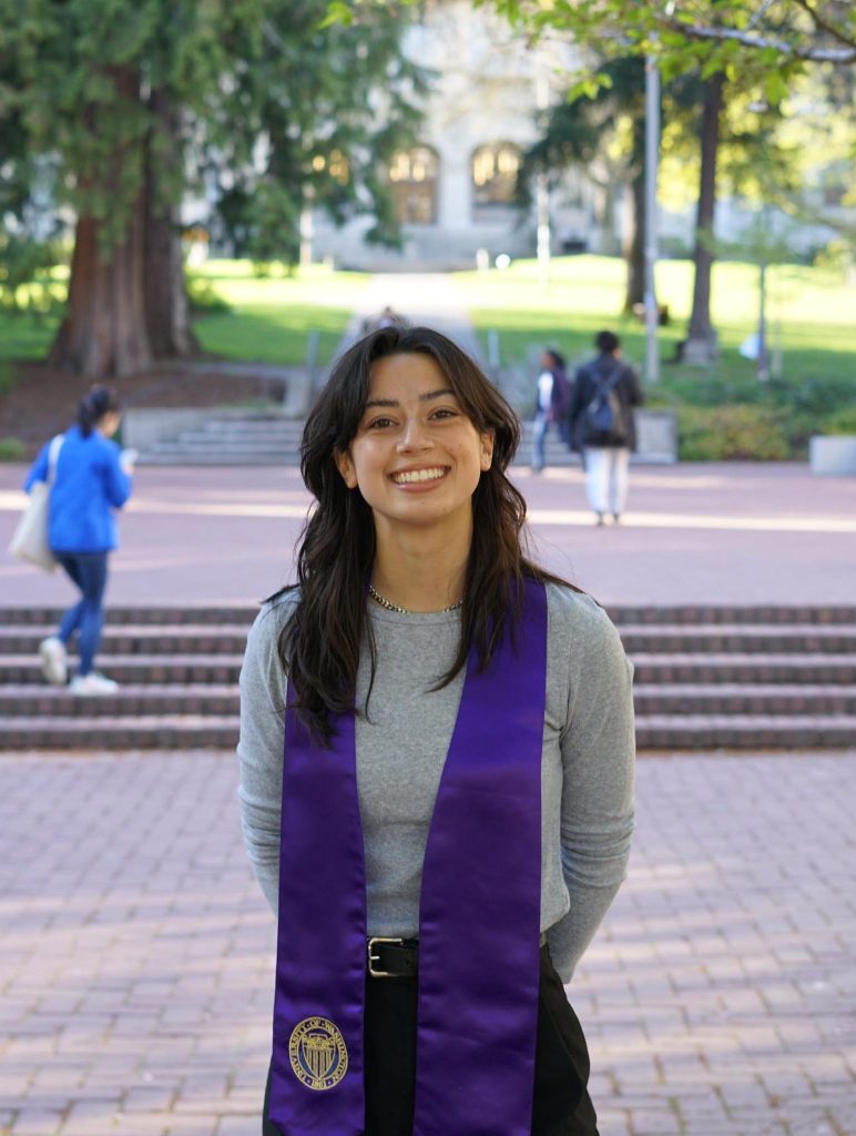 Close up of Grace Nice with a purple UW sash.