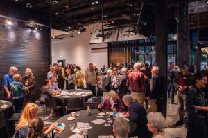 Department community members socializing at the ESS 130th Anniversary Celebration in the Burke Museum.