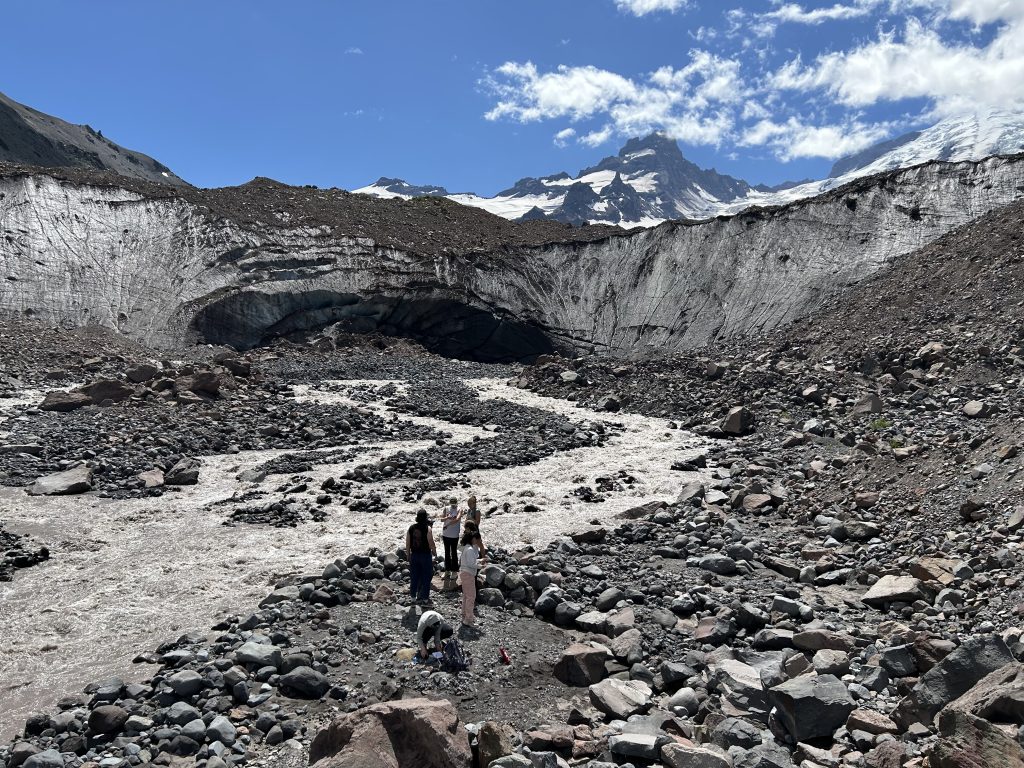 The ice wall and outlet stream at the terminus of Mount Rainier's Emmons Glacier on July 16, 2025. Emmons lower glacier is covered in debris, partially the result of a landslide in 1963.
