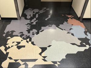 The Johnson Hall ground level stairway floor tiles, depicting the continents as they appeared 180 million years ago.