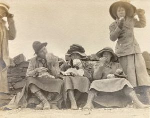 Four women eating lunch during fieldwork.