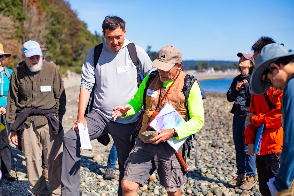 Terry Swanson with ESS alums during a field trip to Whidbey Island.