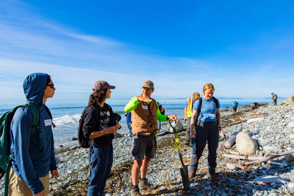 Terry Swanson with three new graduate students during a field trip to Whidbey Island.